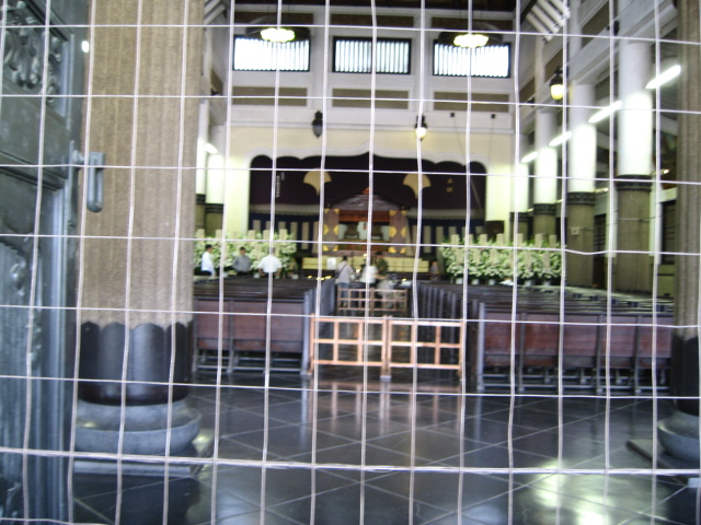 Peeking into the sanctuary.